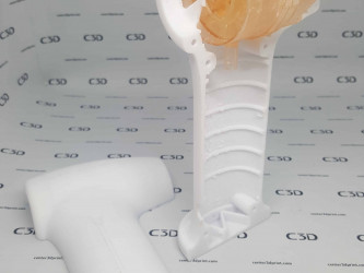 3D printing of the device prototype - PLA plastic and the biocompatible Formlabs Biomed Amber photopolymer